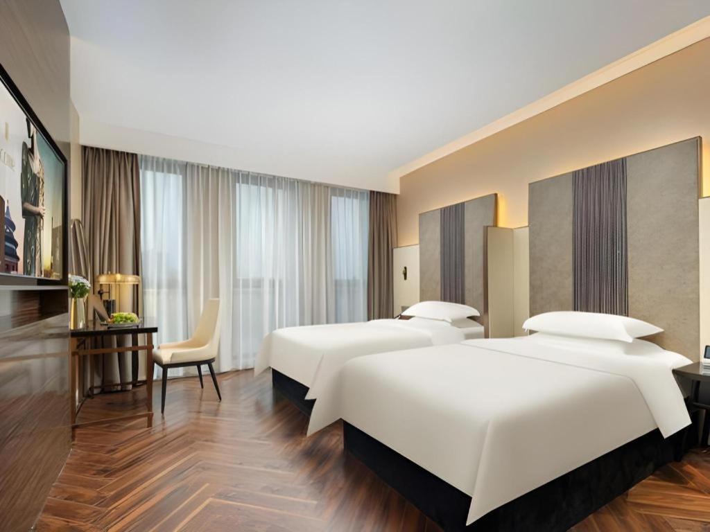 Jinjiang Metropolo Hotel - Taizhou Wanda Plaza Buitenkant foto